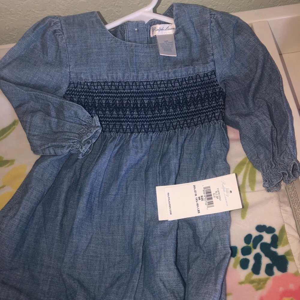 BNWT denim jumpsuit with snap closure